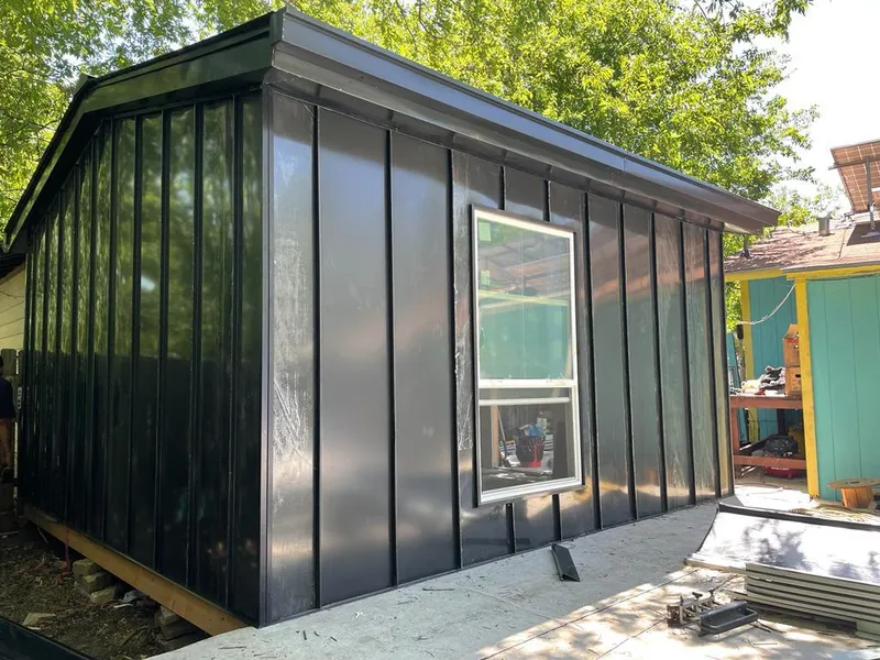 Black standing seam metal wall panels for Roof Inspection in High Springs