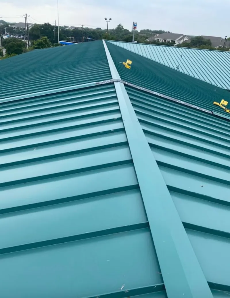 Green commercial metal roof ridge and valley for Metal Roof Repair in High Springs